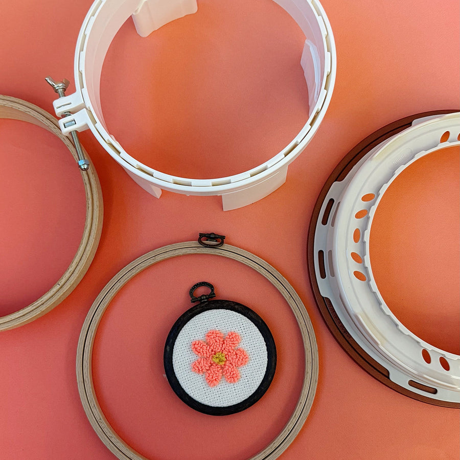 Hoops and stands to hold punch needle fabric