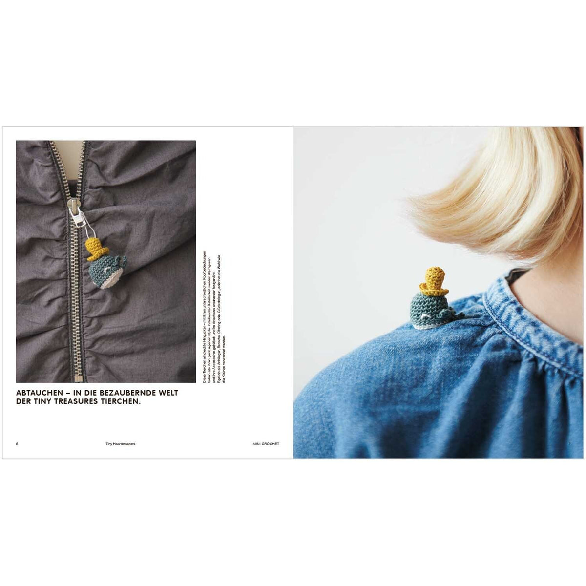 Kleiner gehäkelter Wal-Brooch an Jacken-Reißverschluss und Jeanshemd