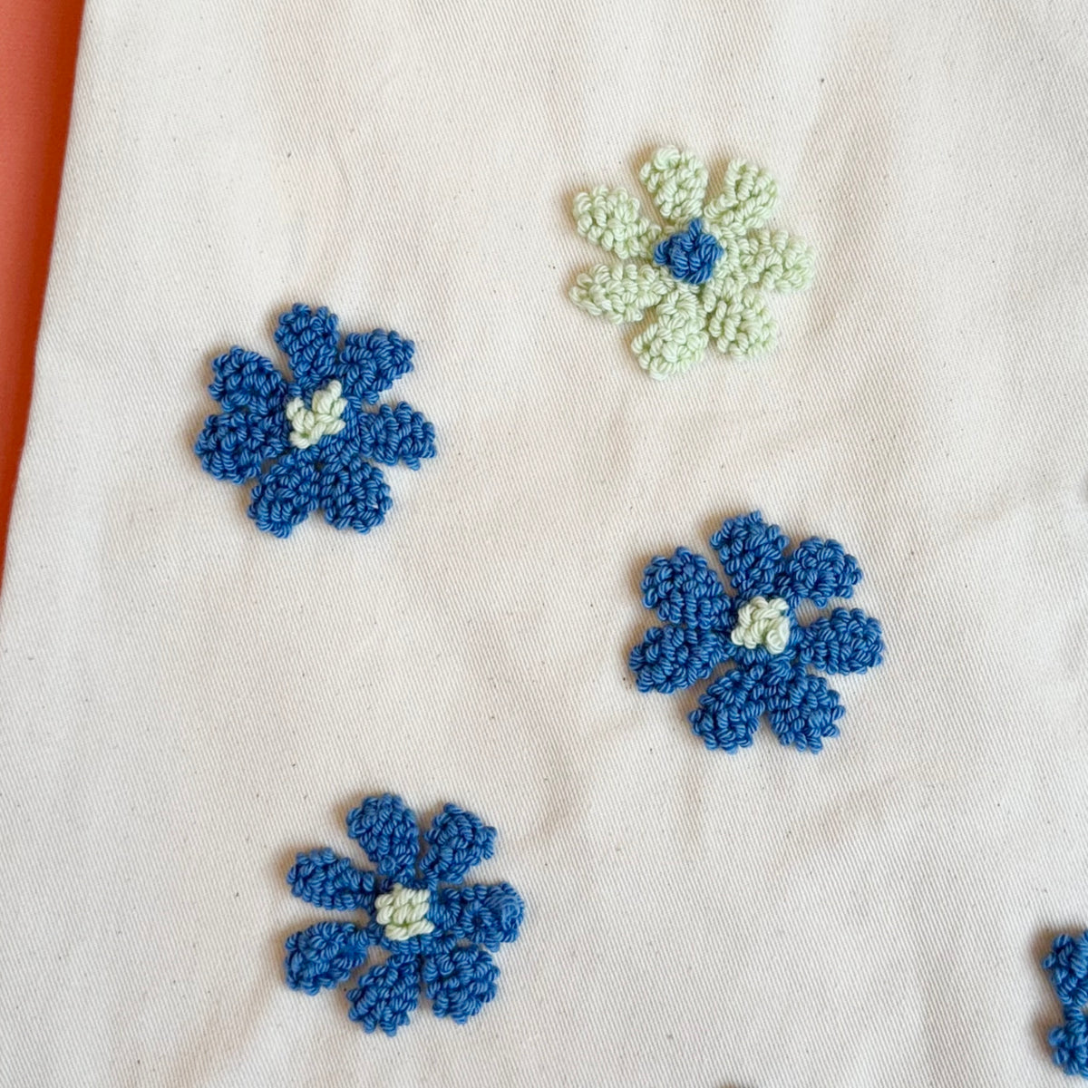 Floral punch needle bag, finished front view