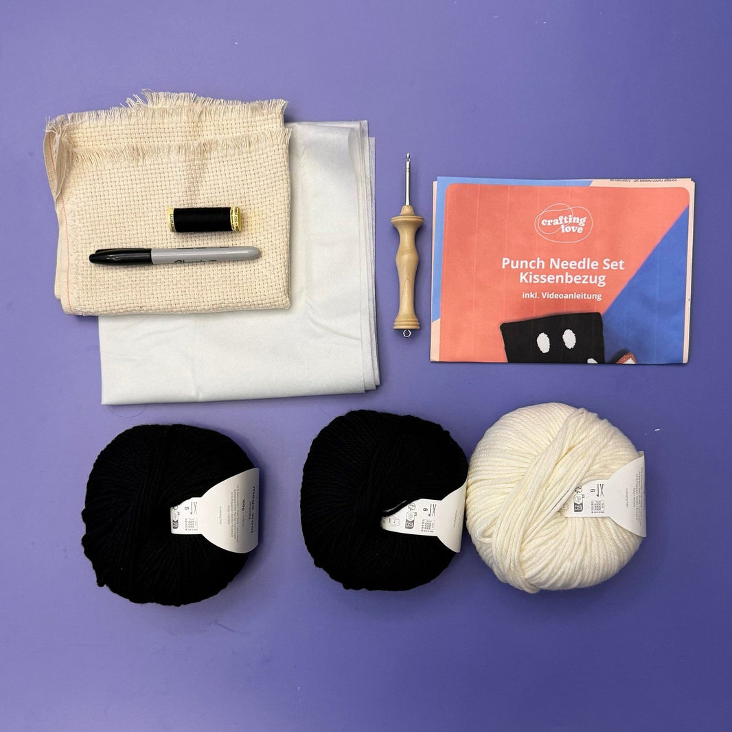 Punch needle pillowcase kit components laid out