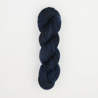 Fine punch needle yarn swatch in Blackbird variegated colours