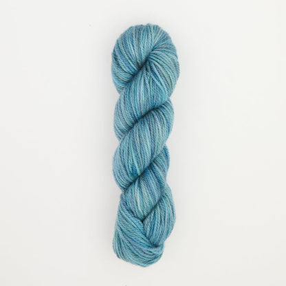 Fine punch needle yarn swatch in Atlantic variegated colours