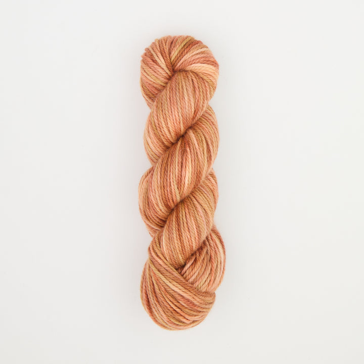 Fine punch needle yarn swatch in Blush variegated colours