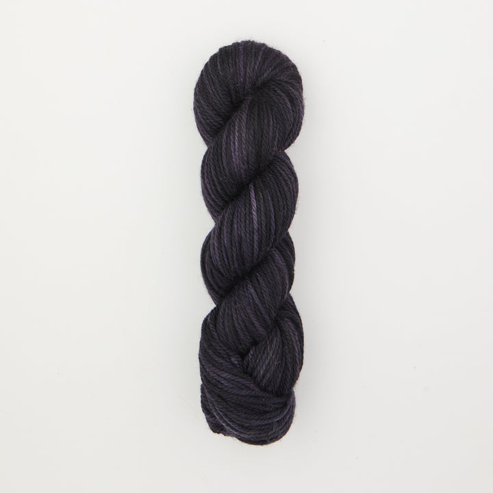 Fine punch needle yarn swatch in Blackberry variegated colours