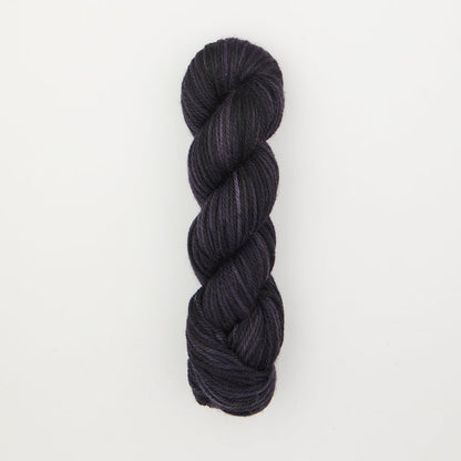 Fine punch needle yarn swatch in Blackberry variegated colours
