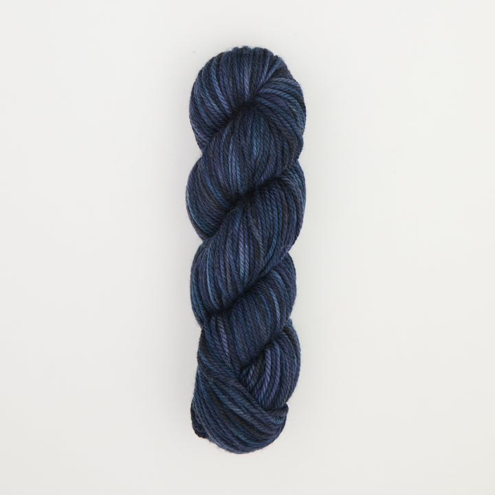Fine punch needle yarn swatch in Blue Jeans variegated colours