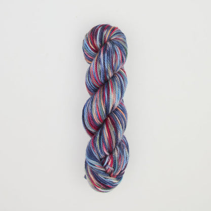 Fine punch needle yarn swatch in Blue Suede variegated colours