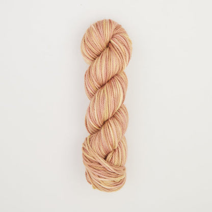 Fine punch needle yarn swatch in Biscuit variegated colours