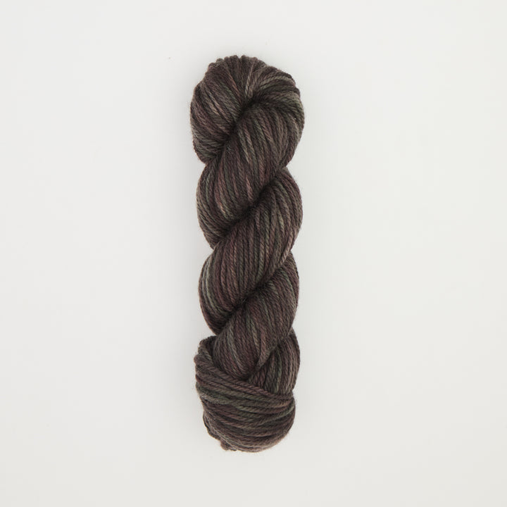 Fine punch needle yarn swatch in Black Rhino variegated colours