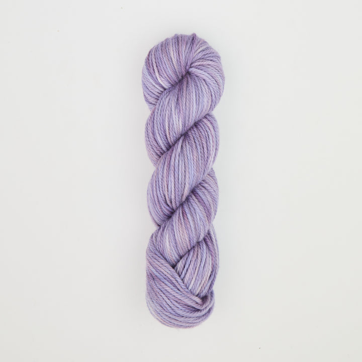 Fine punch needle yarn swatch in Amethyst variegated colours