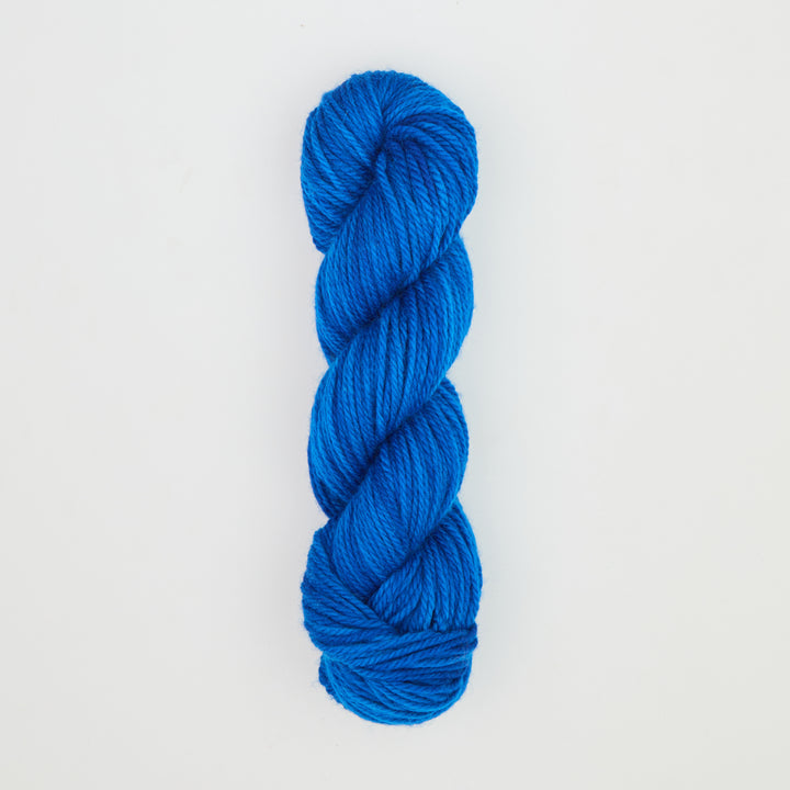 Fine punch needle yarn swatch in Blue Ribbon variegated colours