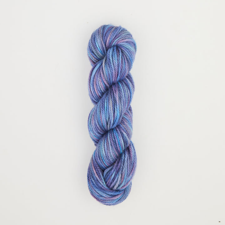 Fine punch needle yarn swatch in Blue Noodle Alien variegated colours