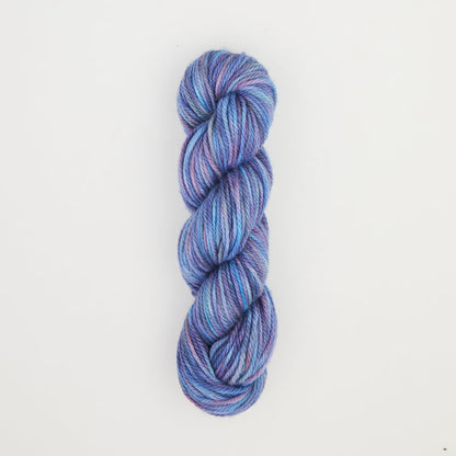 Fine punch needle yarn swatch in Blue Noodle Alien variegated colours