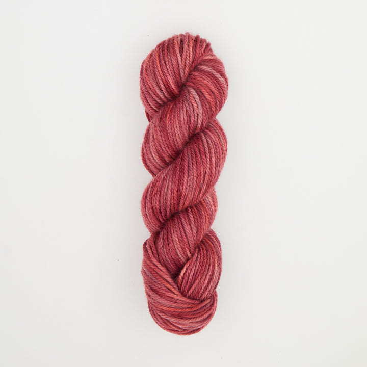 Fine punch needle yarn swatch in Barbara Rose variegated colours