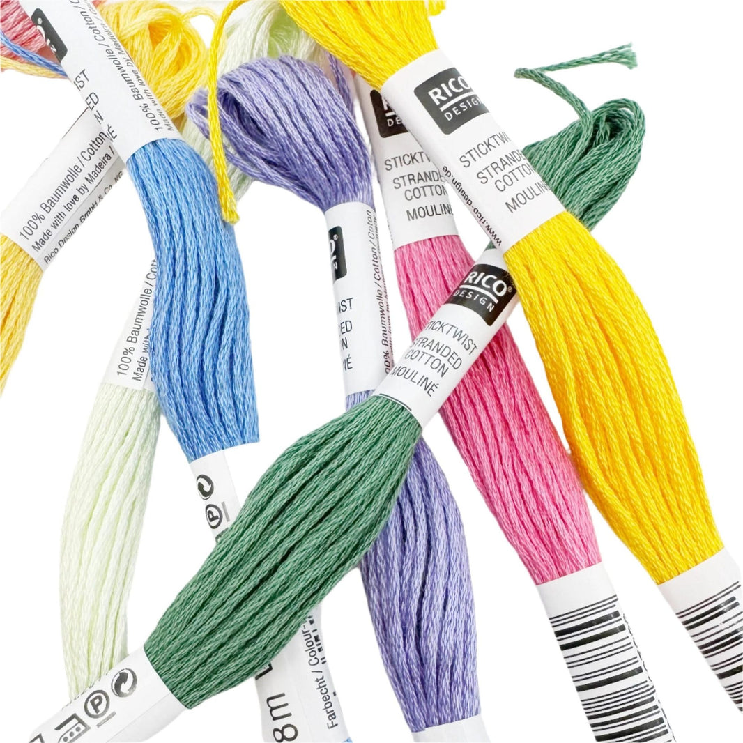 Stranded cotton embroidery floss arranged by colour