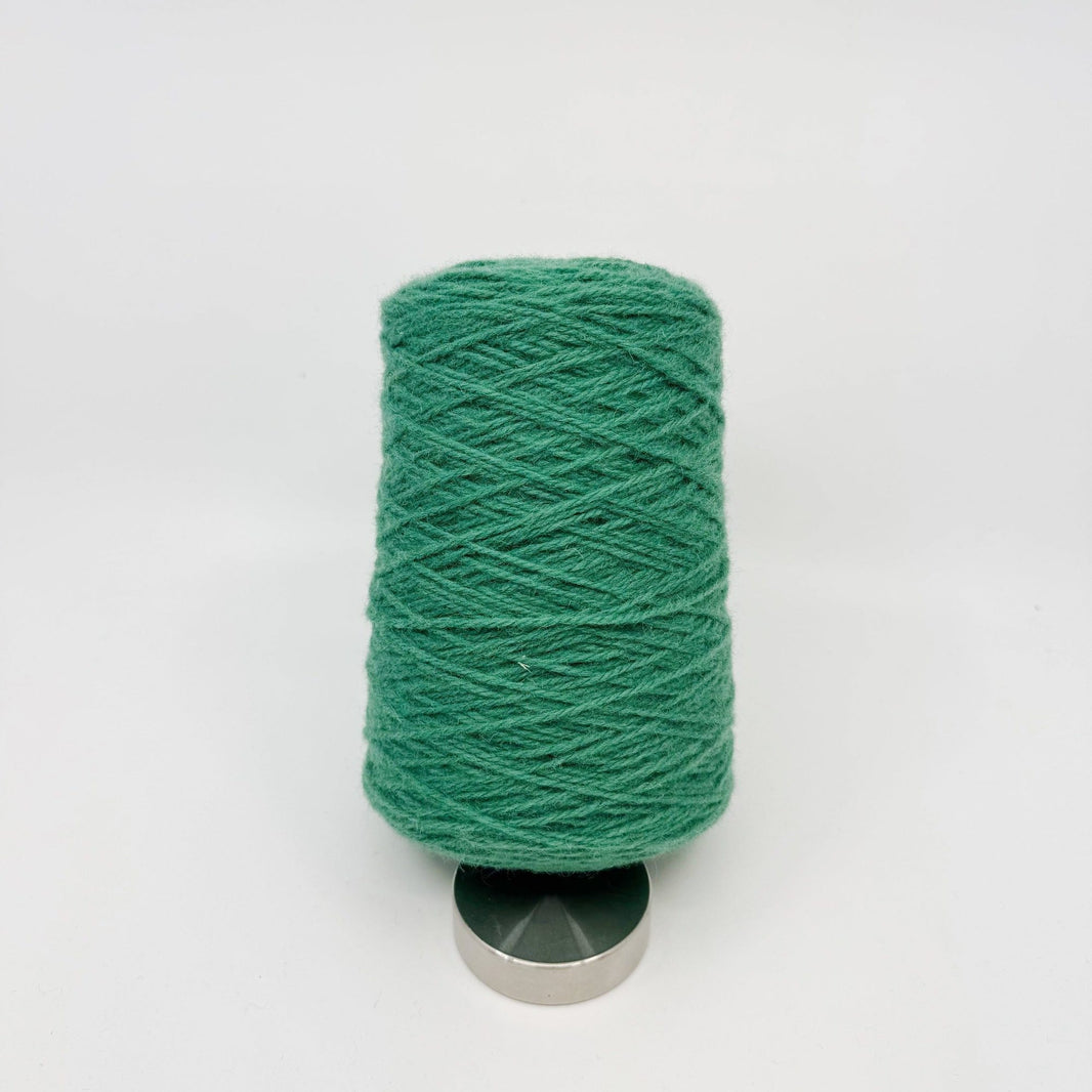 Tufting wool cone in a dusty mauve shade